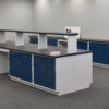 Angled view of 16 ft blue laboratory island with center shelf and sink.