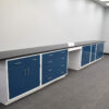 Angled view of blue laboratory cabinets.